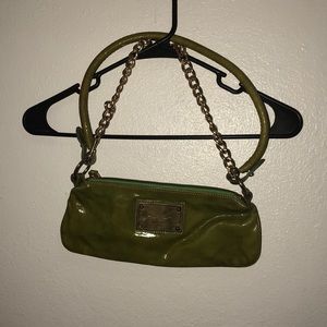 Guia’s Italian leather green chained purse